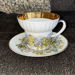 Teacup with real gold edge on the cup and saucer